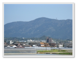 [Picture of a mountain sloping up in the distance]
