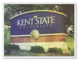 [Picture of a sign reading 'Kent State University' at the school's entrance]