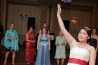 The bride tosses her bouquet